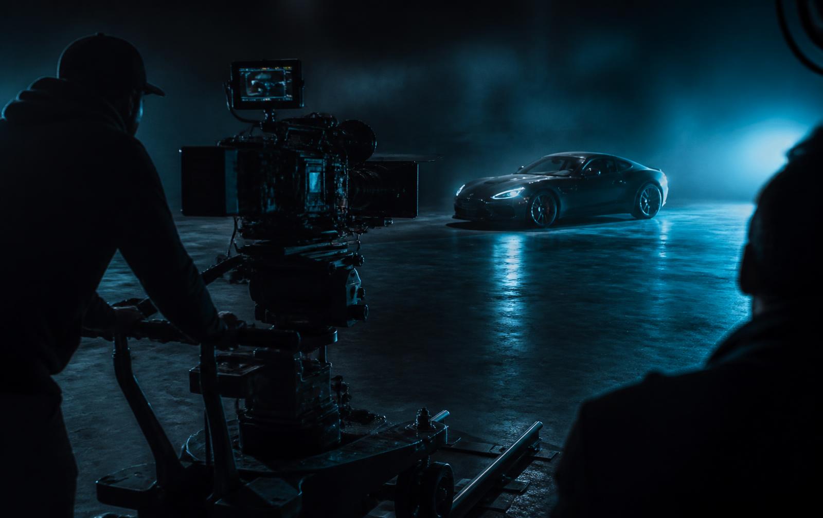 Campaign film shoot in progress on a darkened studio floor